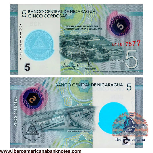 Billete de 5 córdobas de Nicaragua de 2019, en polímero, Pick 219, conmemorativo del 60 aniversario del Banco Central de Nicaragua, sin circular. Anverso con la sede del Banco Central; reverso con el escudo nacional y un paso elevado de Managua.